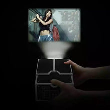 Cargar imagen en el visor de la galería, Mini proyector de teléfono inteligente para cine en casa, proyector de cartón artesanal para teléfono jueguete para niños divertido ( totalmente obscuras )
