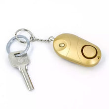 Cargar imagen en el visor de la galería, Llaveros de alarma Personal con sirena de sonido seguro para mujer, llavero con alarma de seguridad y defensa Personal LED de ataque a la luz, para mujeres y niños varios colores - mychinashop.com