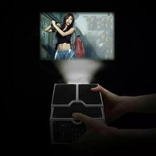 Cargar imagen en el visor de la galería, Mini proyector de teléfono inteligente para cine en casa, proyector de cartón artesanal para teléfono jueguete para niños divertido ( totalmente obscuras )