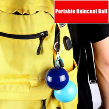 Cargar imagen en el visor de la galería, Impermeable desechable portátil para adultos, llavero con bola de compresión, Bola de bolsillo, Poncho para viajes al aire libre, equipo de Camping, novedad!! MOD IMPERMEABLE ESFERA
