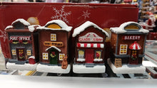 Cargar imagen en el visor de la galería, Casas Para Villa navideña con luces  4 pz material resina con baterías triple a no incluidas MOD ZS630
