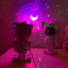 Cargar imagen en el visor de la galería, Proyector de luz con bocina nocturna de astronauta Aurora boreal MOD ZE-1490

