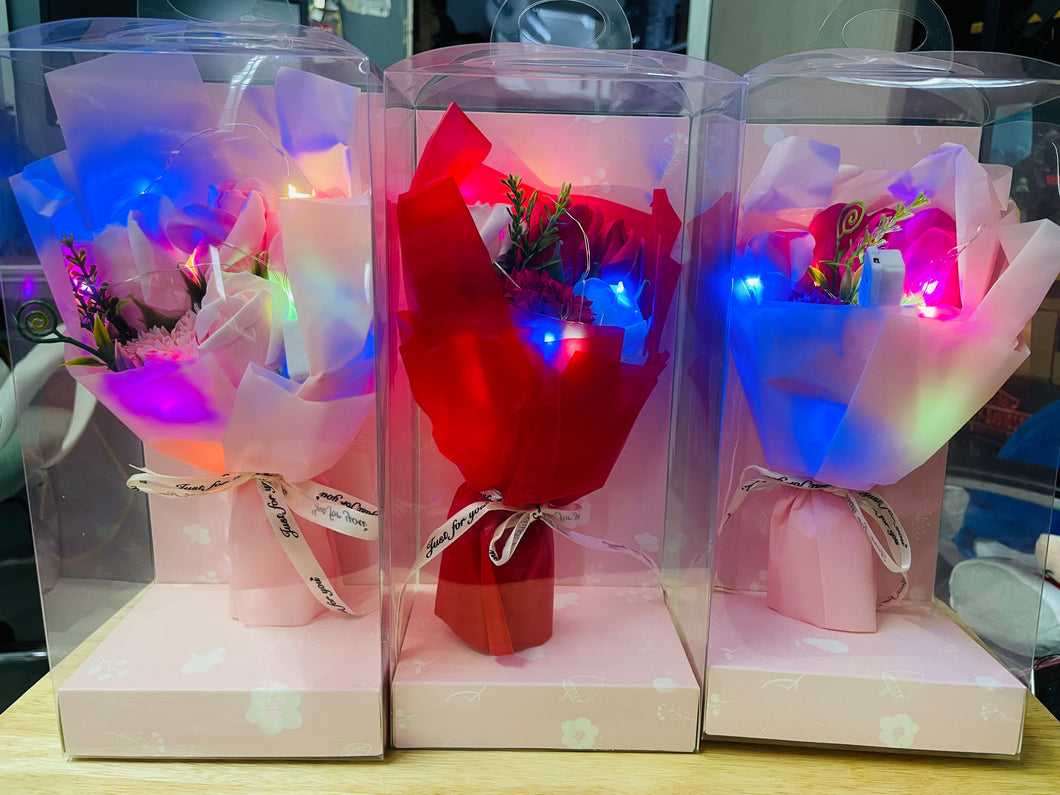Caja de regalo con flor aromática y luz