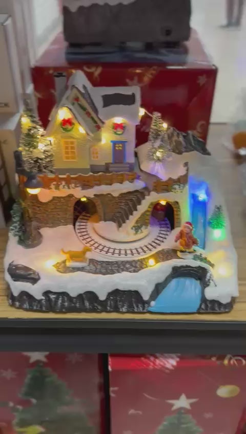 Villa navideña con luz , 8 canciones ,pila ,conexión ala luz MOD W168AB