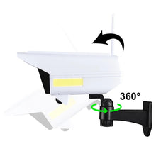 Cargar imagen en el visor de la galería, Lámpara Solar con detección de movimiento 77LED, iluminación de cámara simulada de seguridad de calle al aire libre con Control remoto IP65, foco de 3 modos para jardín.  YH-2178T

