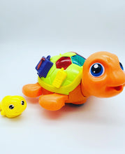 Cargar imagen en el visor de la galería, TORTUGA MOVIBLE CON BEBÉ con luz y sonido MOD 2089
