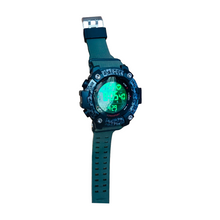 Cargar imagen en el visor de la galería, Reloj digital cronometró resistente al agua 20 m luz led color y correa de silicon

